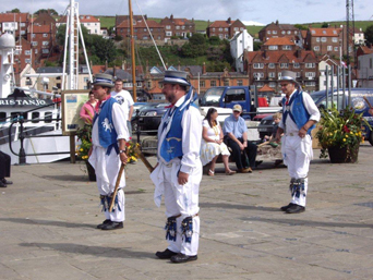  Morris
              Dancers at Whitby Folk Week Photo