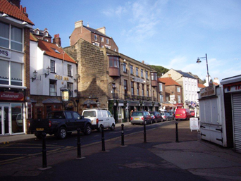 Cafes and shops along Pier Road  Photo