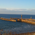 Whitby Piers in the Evening Sun