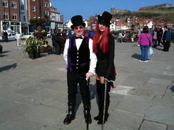 Photo of Gothic couple near the Tourist Information Office