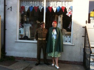 A couple dressed in wartime clothing as part of the Whitby Wartime Weekend