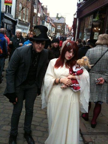 Photo of young gothic couple on Church Street Whitby