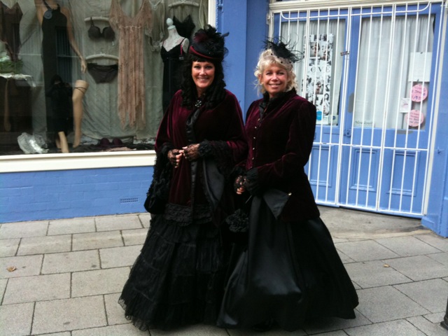 Photo of two Goth ladies outside a Whitby shop
