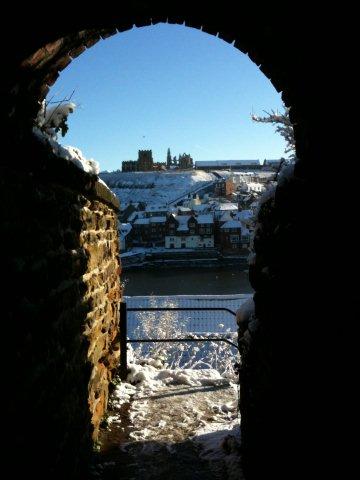 Photo of the East side through an archway