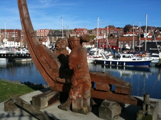 Photo of a wooden sculpture on Whitby Marina