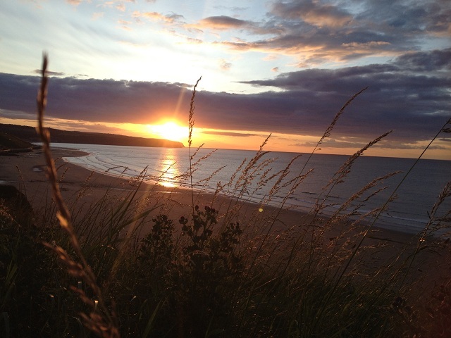 Photo of the sun setting over Sandsend