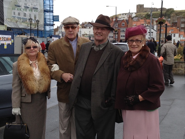 A photo of two wartime couples near Whitby Harbour