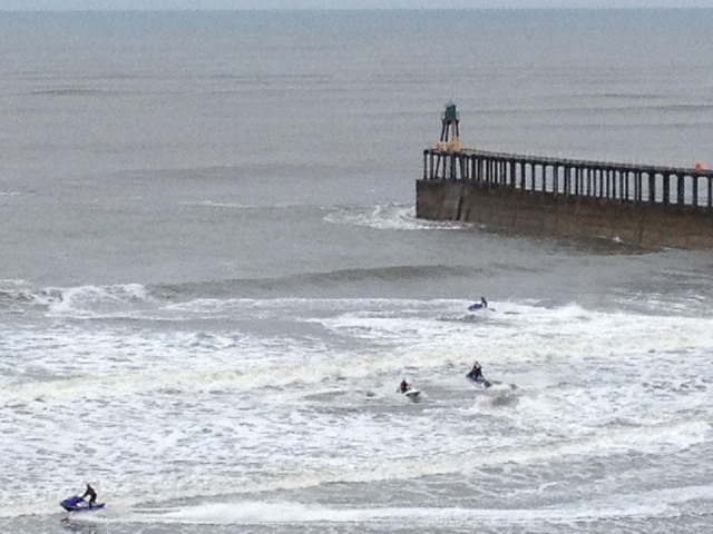 Photo of jet skiers near Whitby West Pier