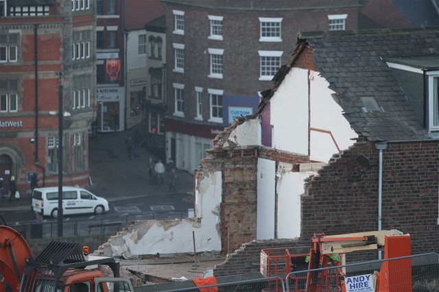 Photo of demolition underway in Aelfleda Terrace, Whitby