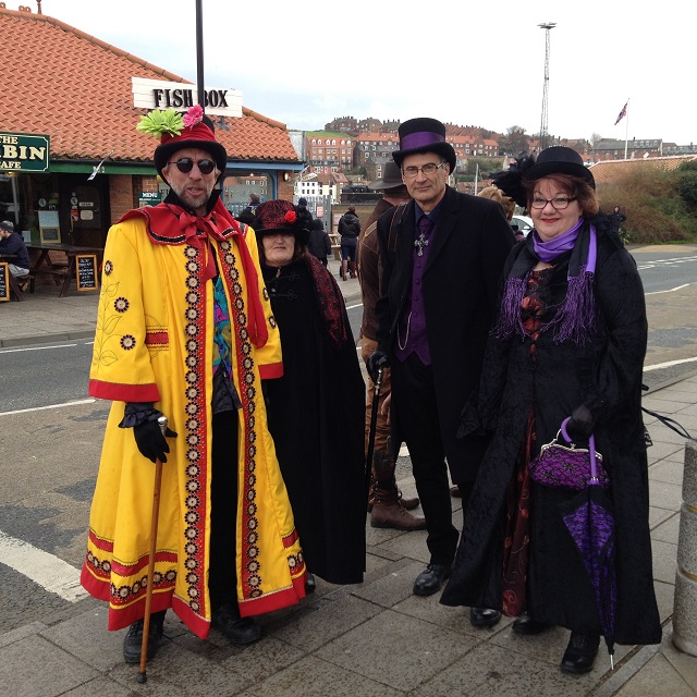 A photo of 4 goth revellers