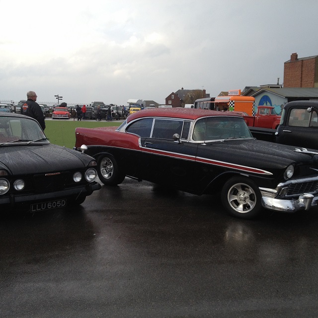 Photo of two black cars at the Kustom Kar showground