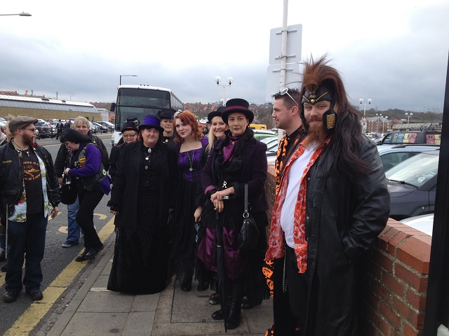 Photo of a group near to the bus stop in Whitby