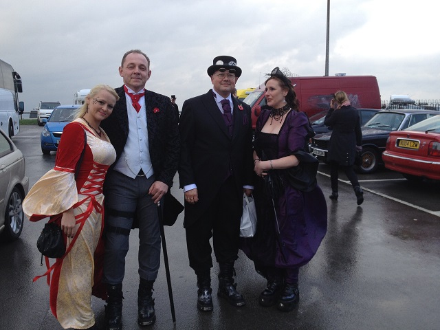 Photo of two Gothic Couples in the rain